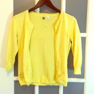 Bright yellow cardigan